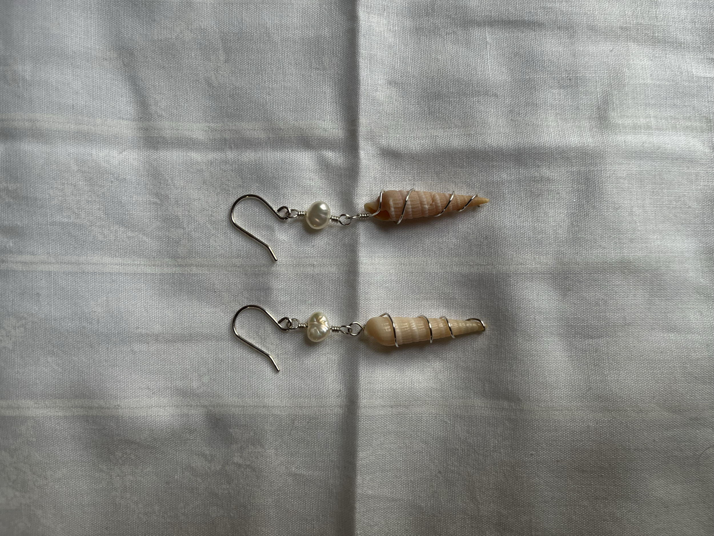 PEARLANDWRAPPEDSHELLEARRINGS(1).png