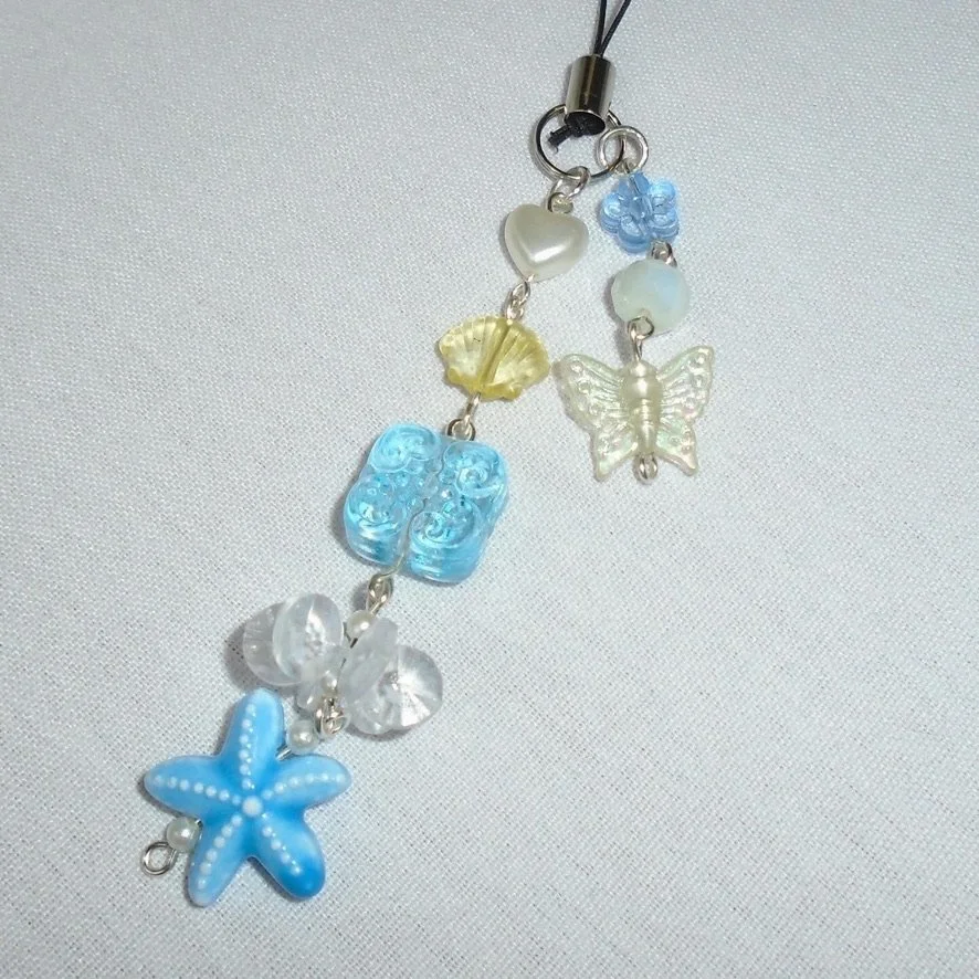BLUE STARFISH PHONE CHARM.jpeg