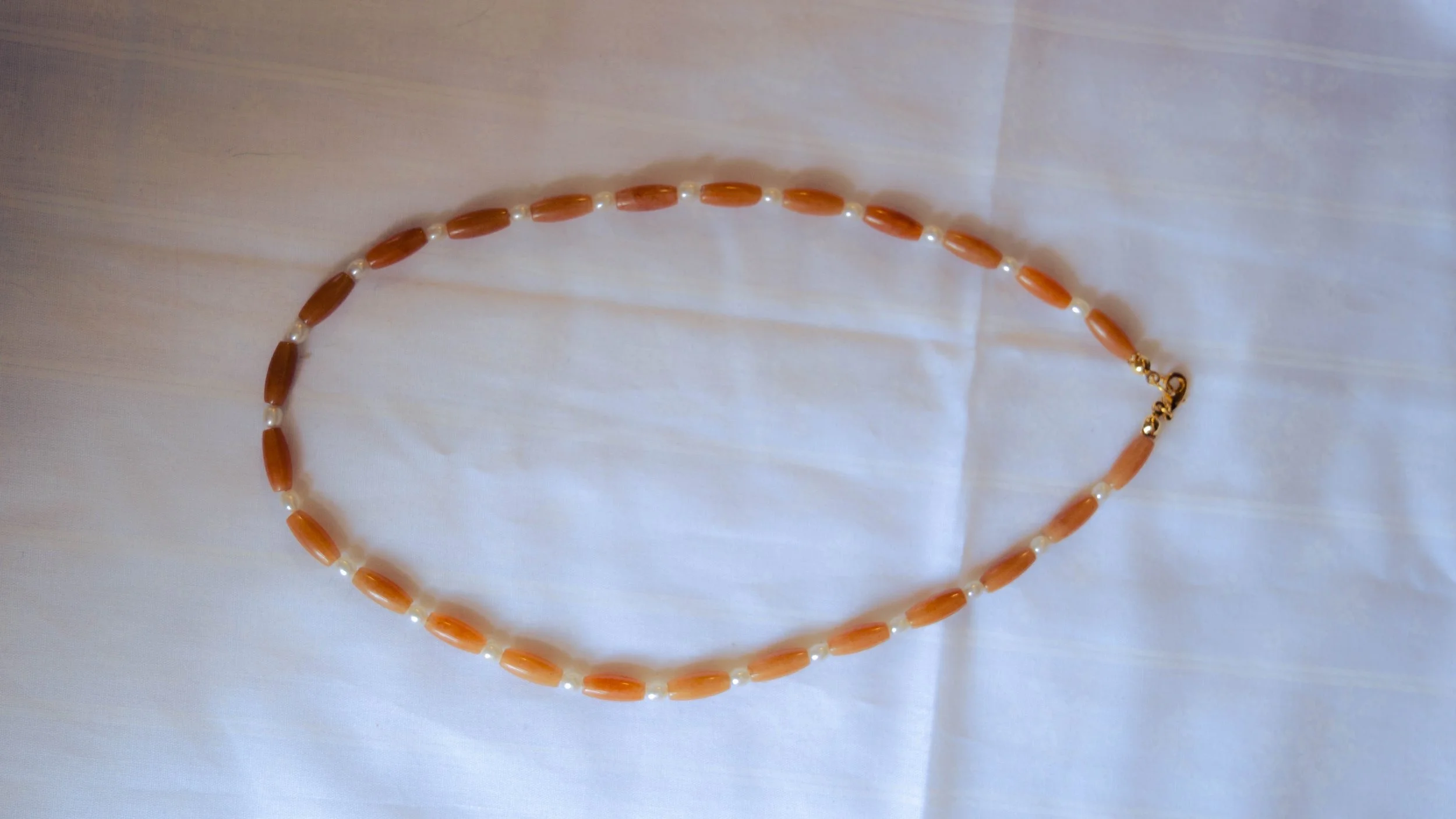 PEARLANDCORALNECKLACE.jpg