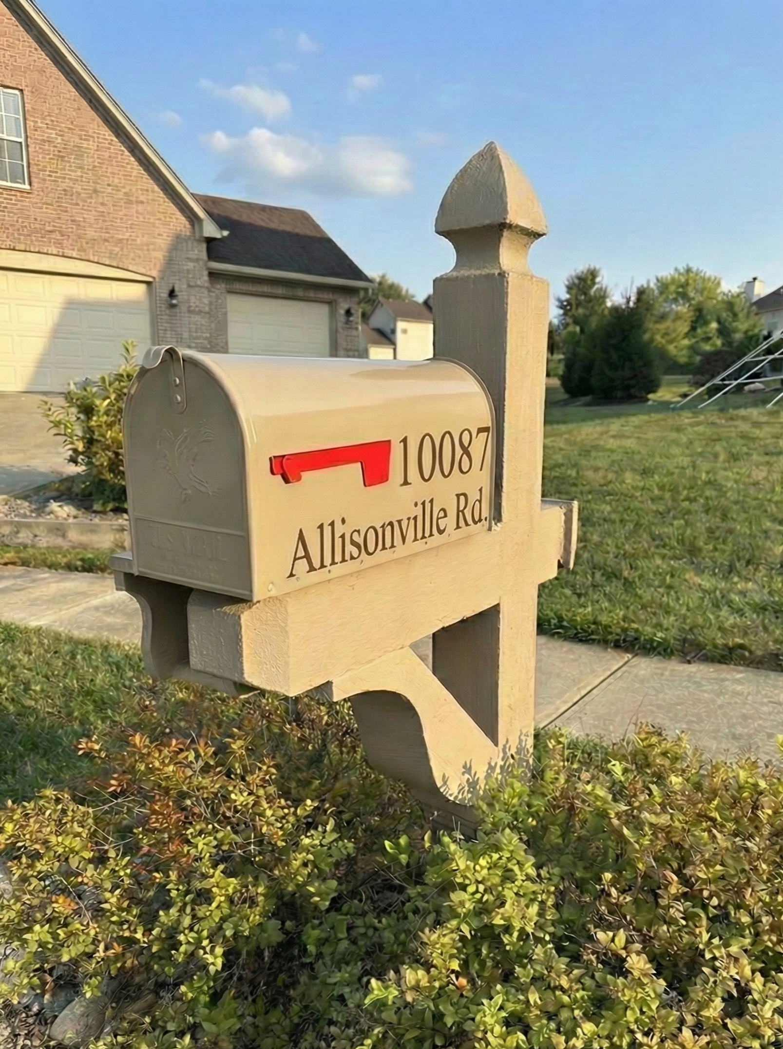Newly installed cedar mailbox post and custom fabricated mailbox