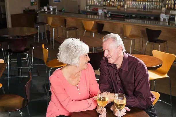 mature-couple-at-bar.webp