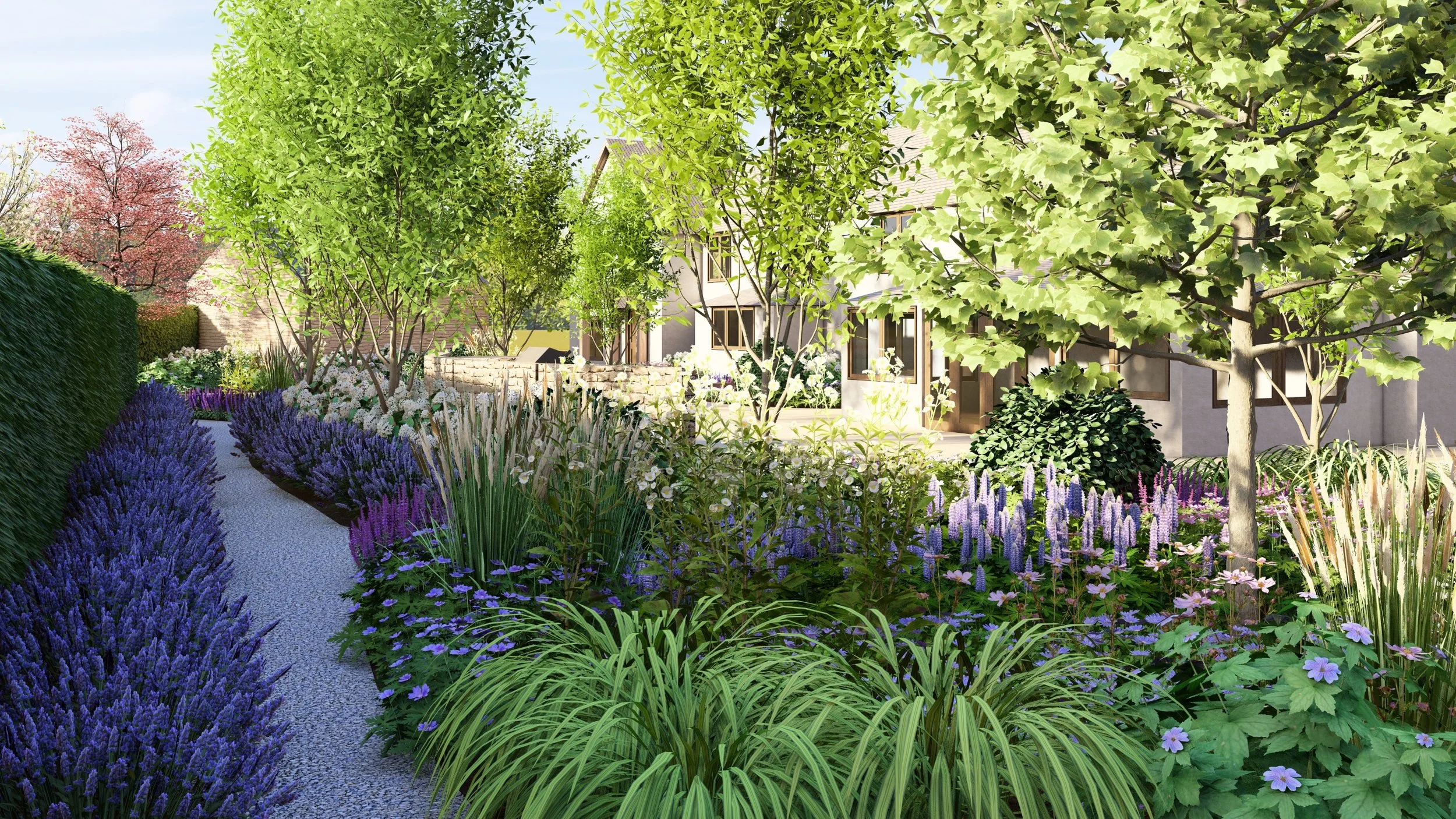 A colorful garden with a gravel pathway surrounded by various flowering plants and trees, and a house in the background.