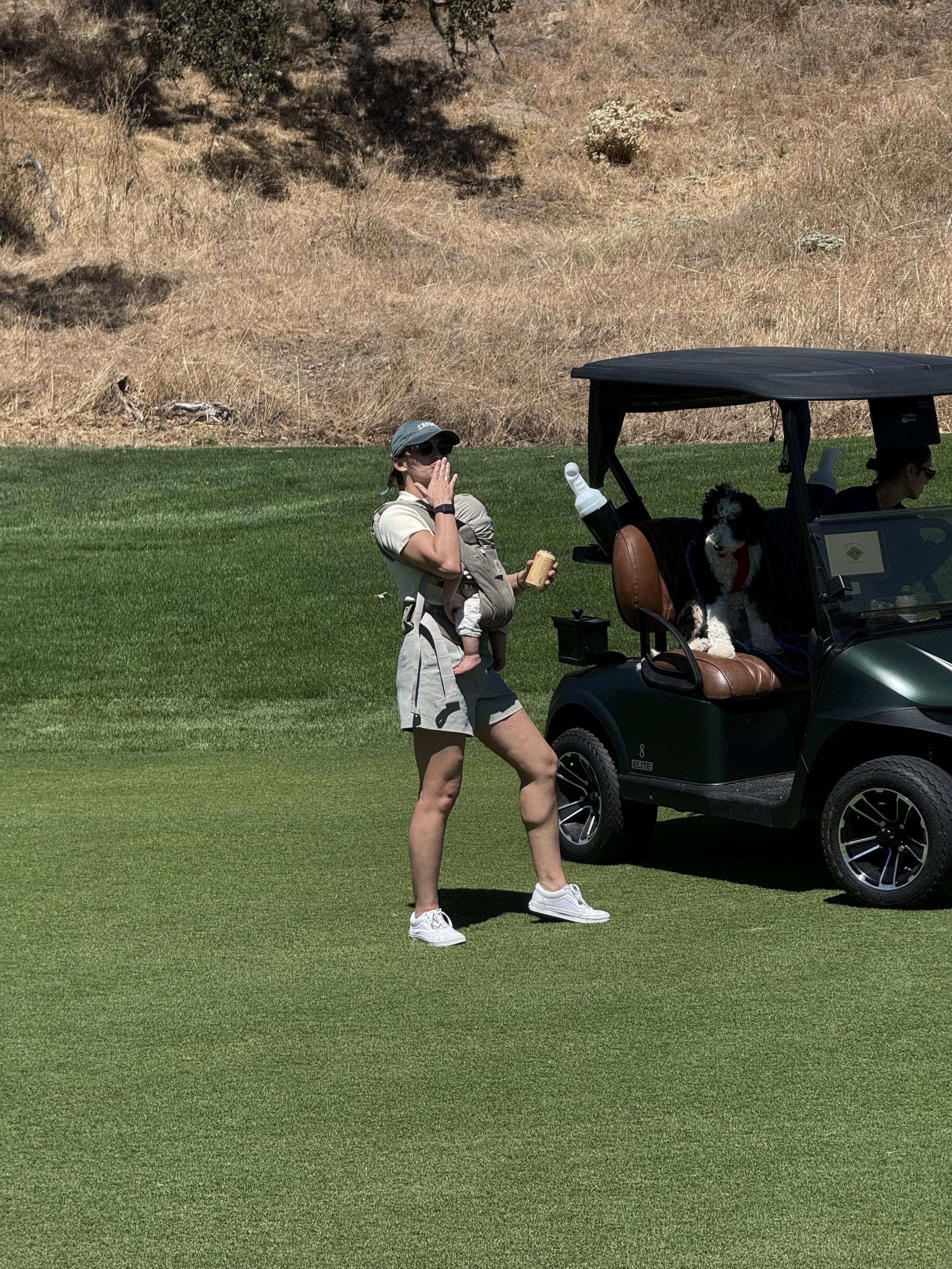 Alyssa following the golf party with nephew in tow
