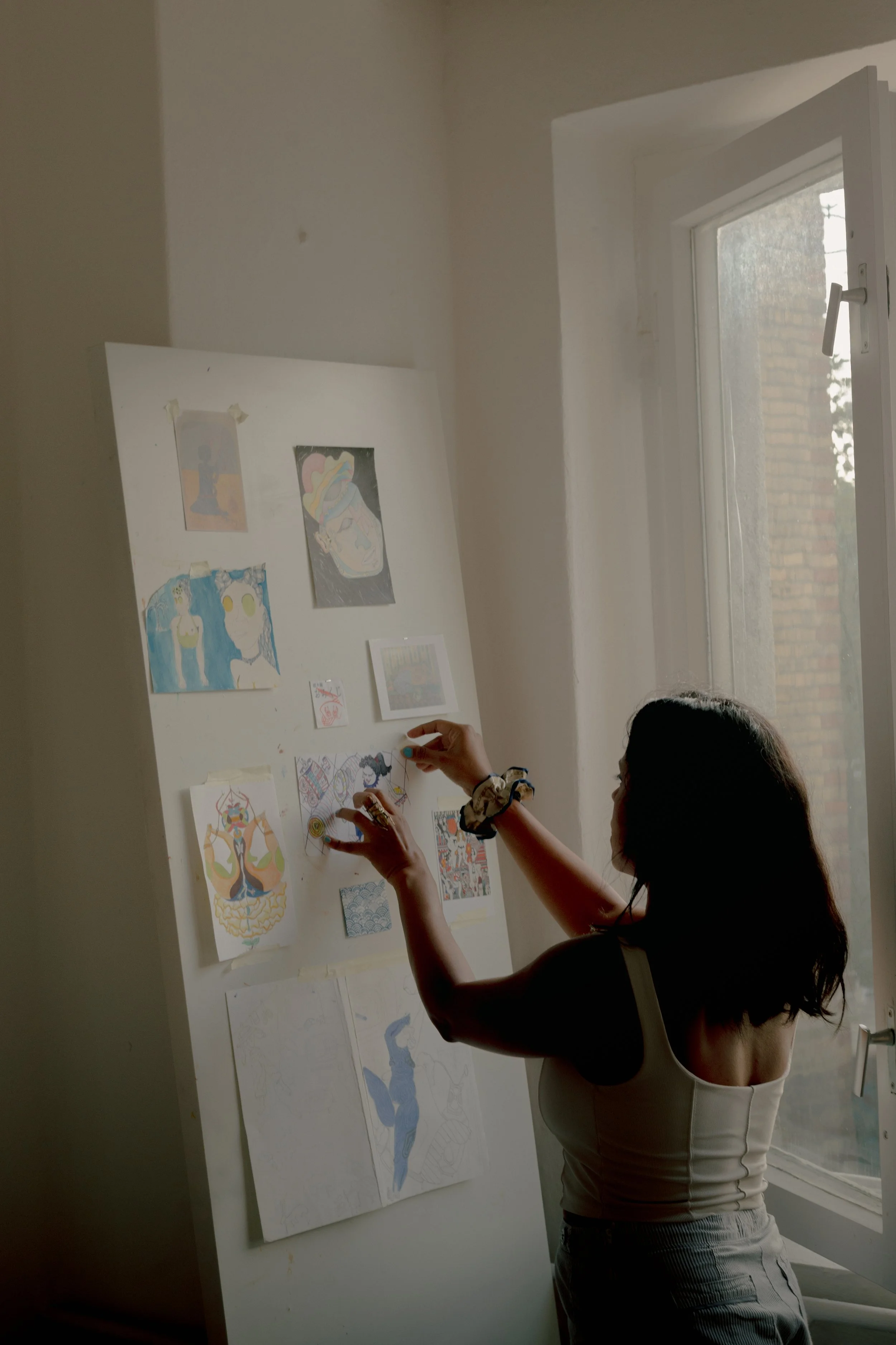 She internalises these images through a lens of humour, which then dictates her creative process. Her work employs a multi-coloured palette and punch line-esque titles to draw the viewer's attention to underlying issues of disconnection and dysfuncti