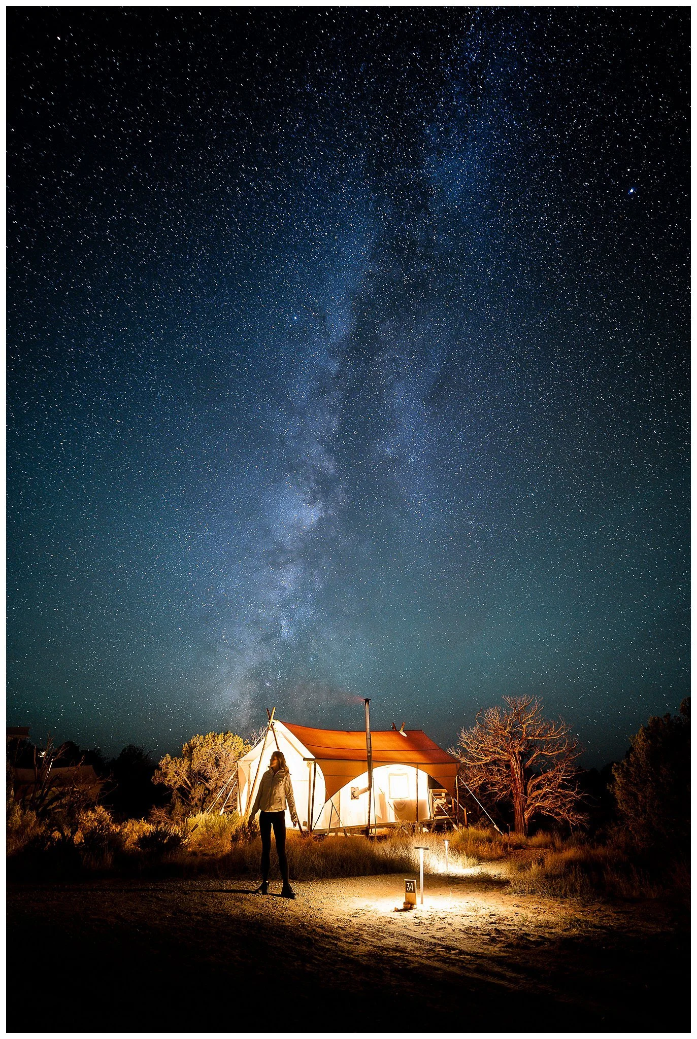 Silhouette of a person under the night sky at Ulum resort.