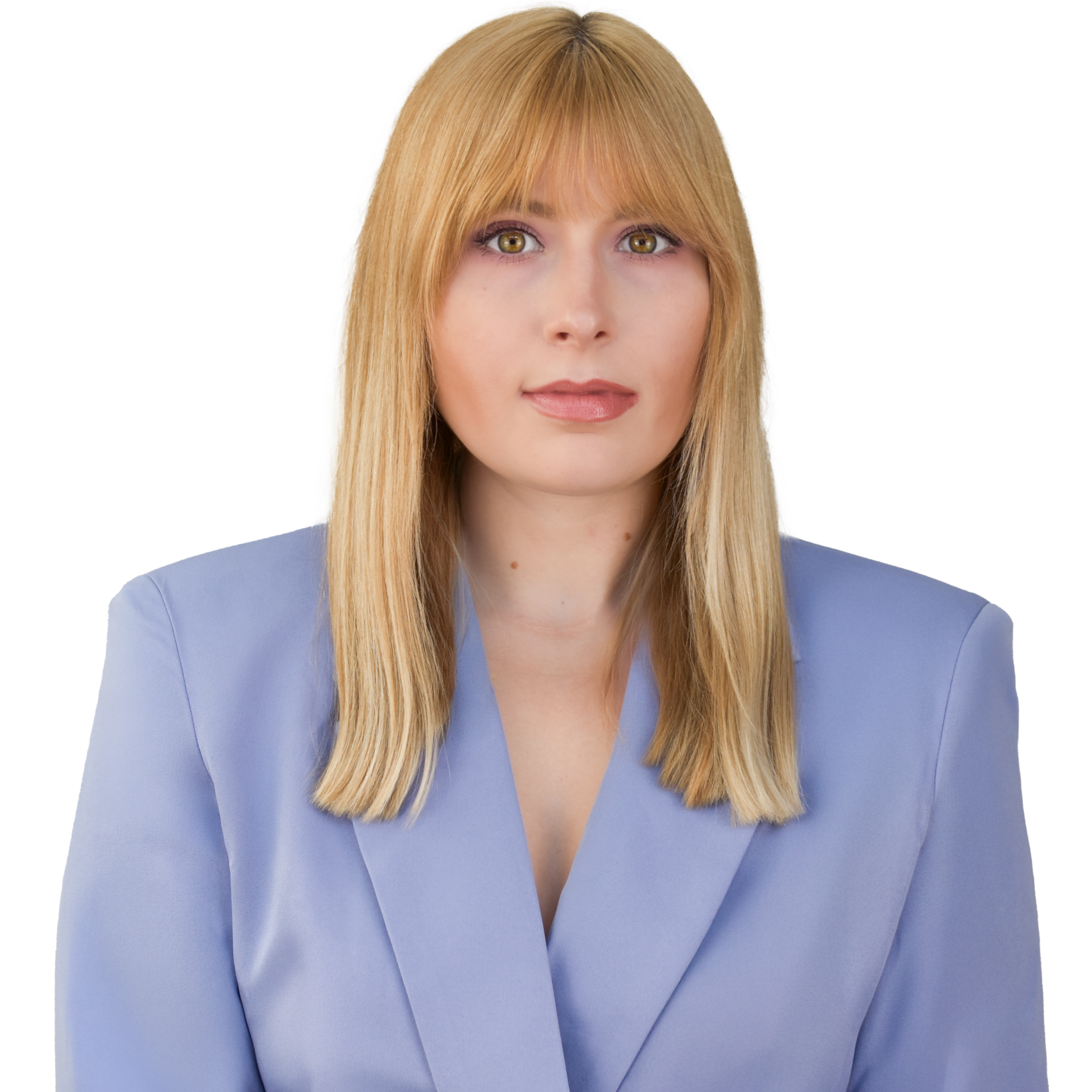 A woman with blonde hair wearing a light blue blazer looking directly at the camera.