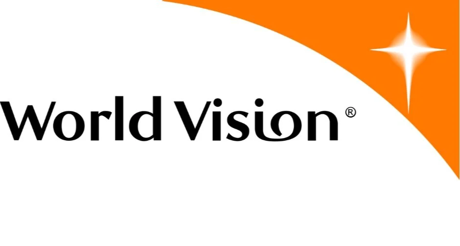 World Vision logo with black text and an orange and white background with a star.