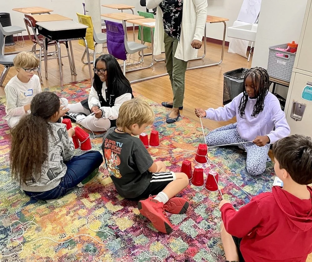 Sterling School kids working on a project together.