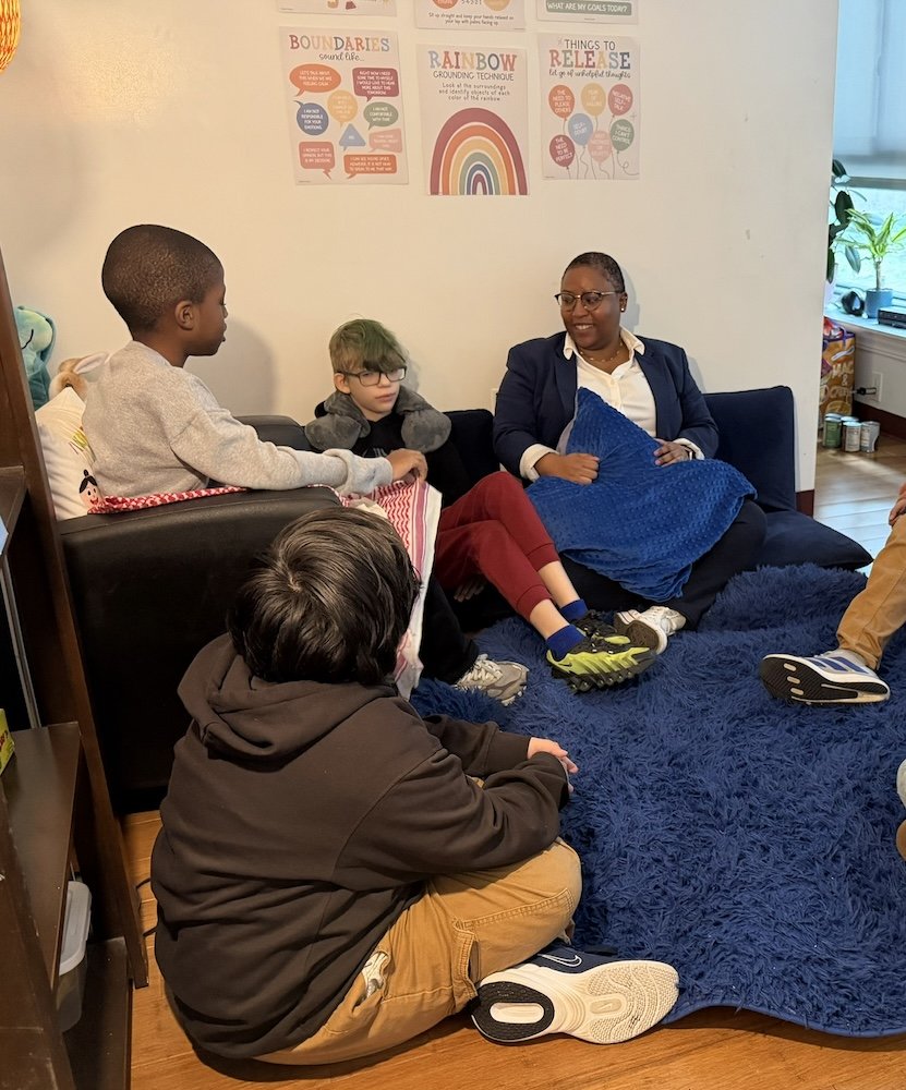Counselor providing support to students at school.