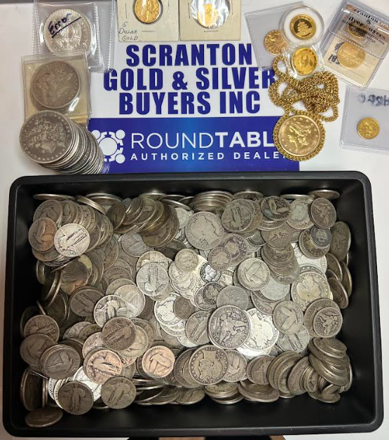 A bulk container of vintage silver coins being evaluated for precious metal cash value at Scranton Gold Buyers.