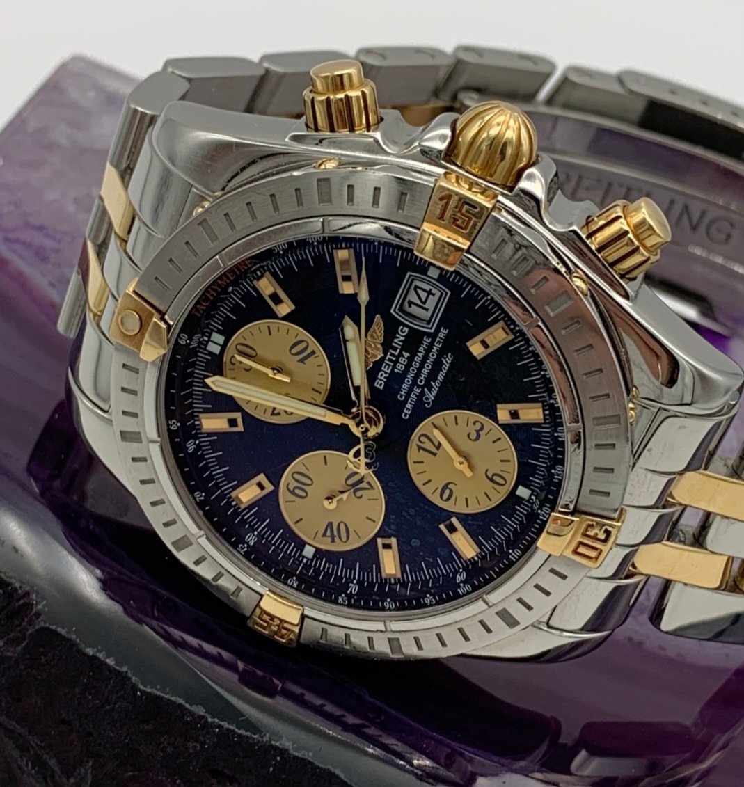 A luxury gold watch being appraised for cash value at Scranton Gold Buyers.
