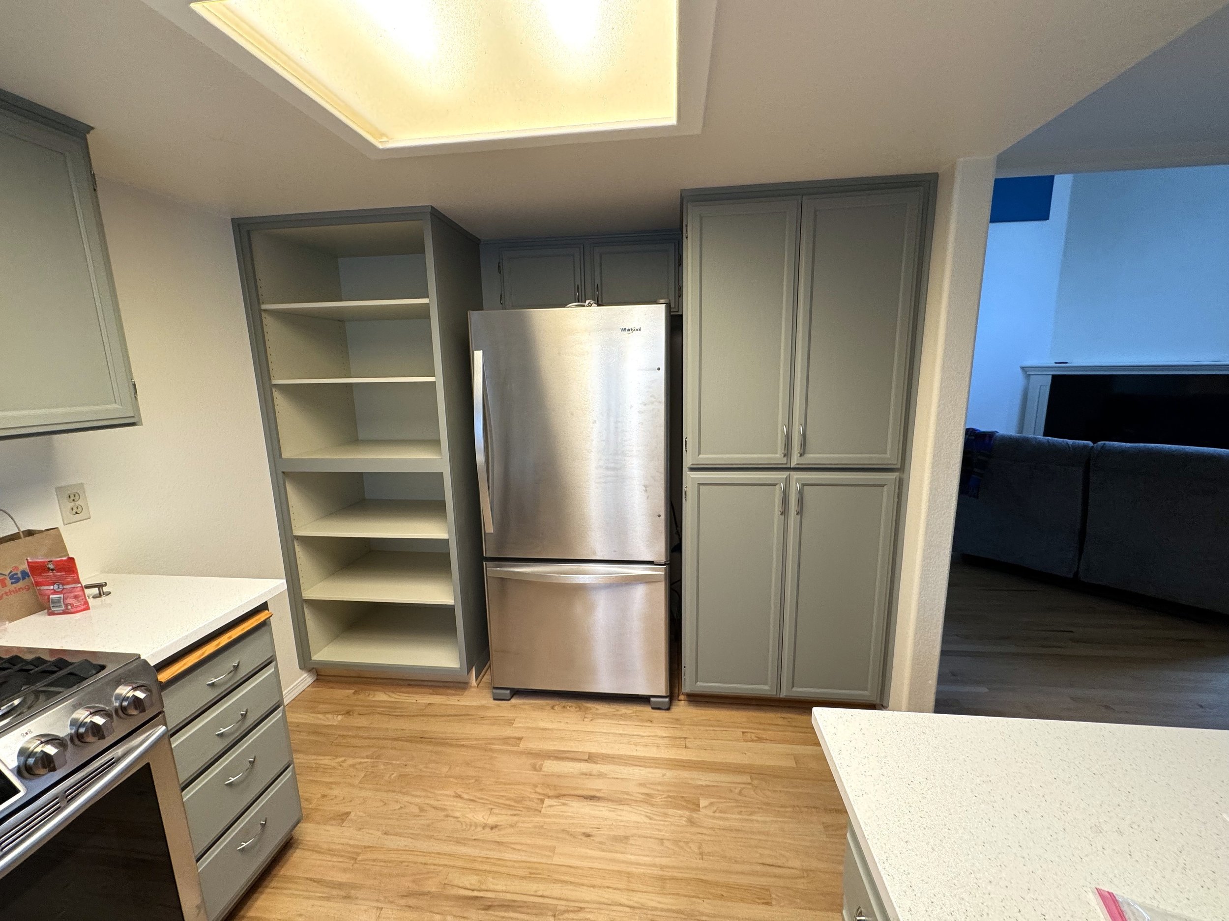 Kitchen Transformation with Custom Cabinetry and Wine Rack
