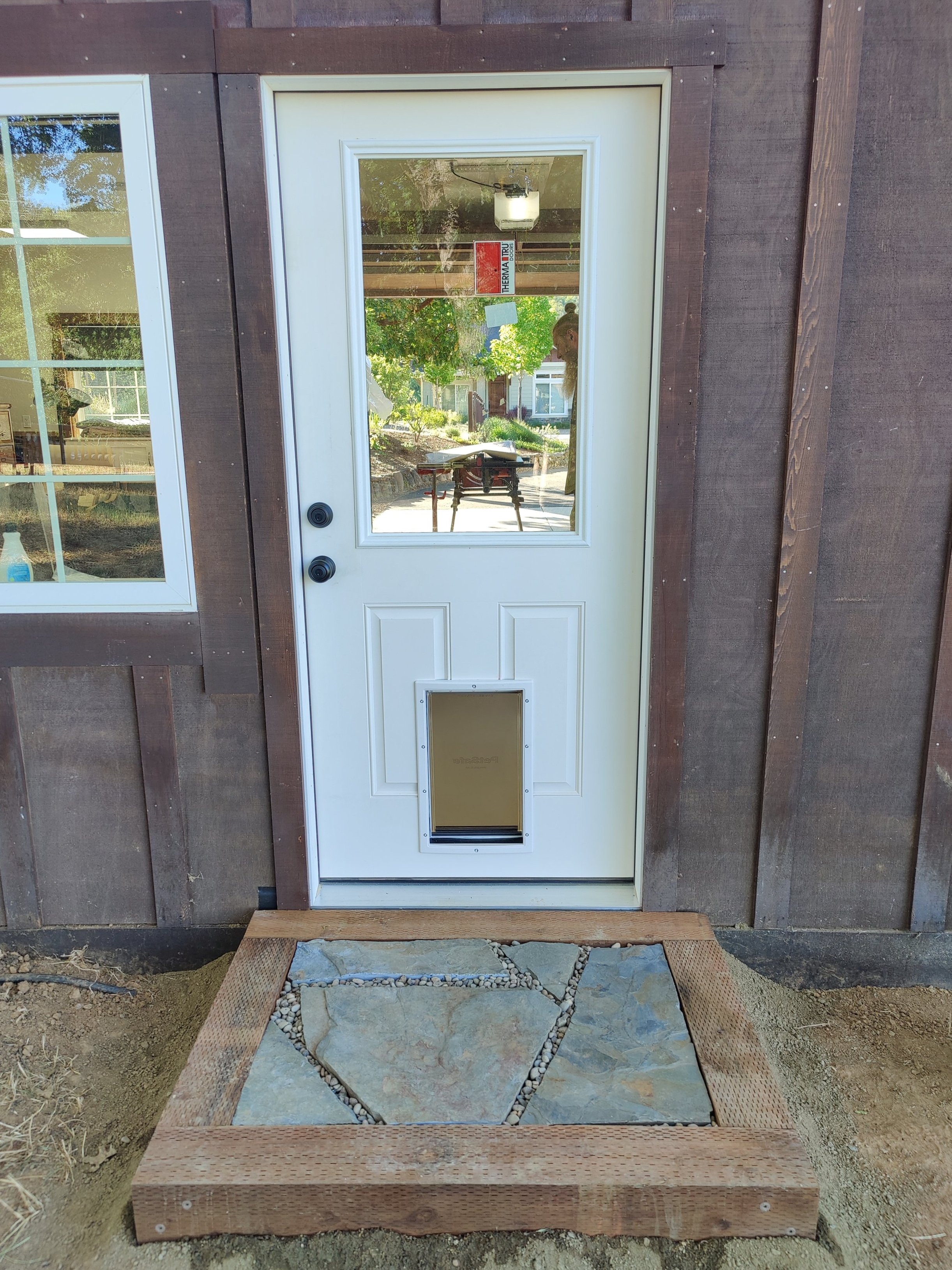 New Garage Entry with Custom Stone Landing