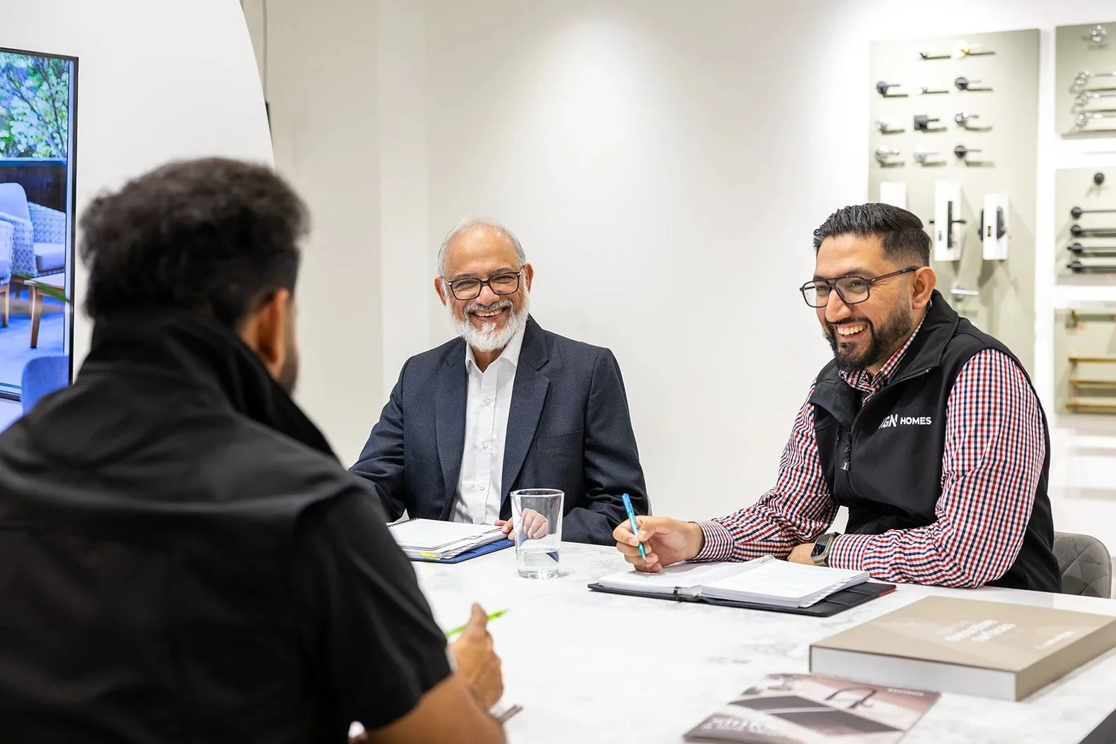 Clients meeting with the KGN Homes team at the Noble Park showroom