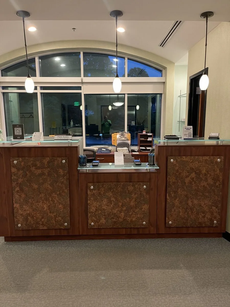 Clean professional office reception area and front desk workspace