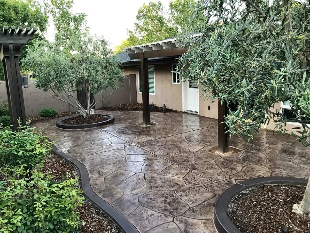 Decorative concrete driveway by Functional Concrete Artistry