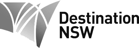 Logo of Destination NSW featuring stylized arches and text.