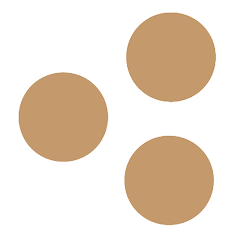 Three brown cookies or biscuits stacked in a pile.