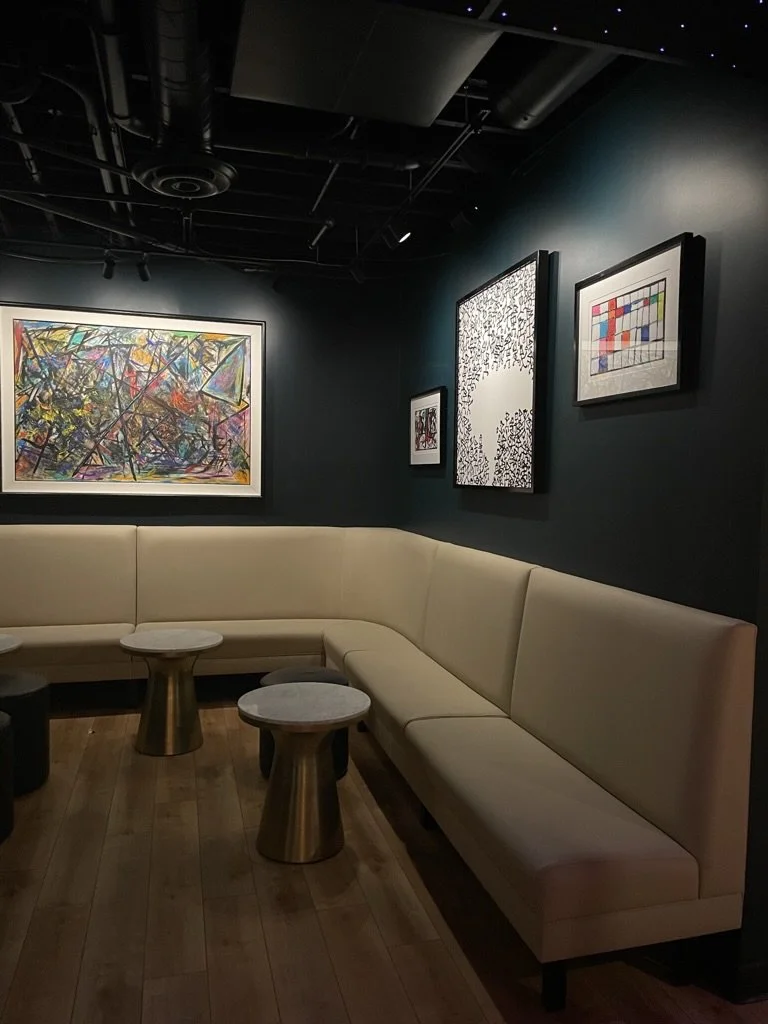 Commercial restaurant electrical install with custom ceiling lighting with starry effect and ambient wall fixtures installed by Walter Electrical Contractors in Minnesota for a cozy lounge space.