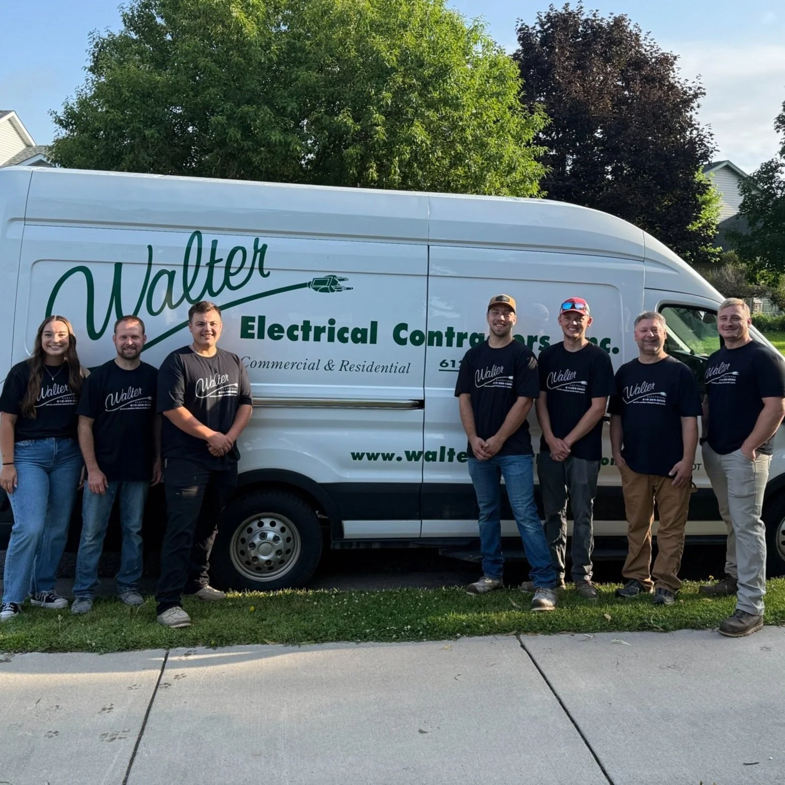 Walter Electrical Contractors team standing in front of branded service van in Minnesota, ready for residential and commercial electrical projects.