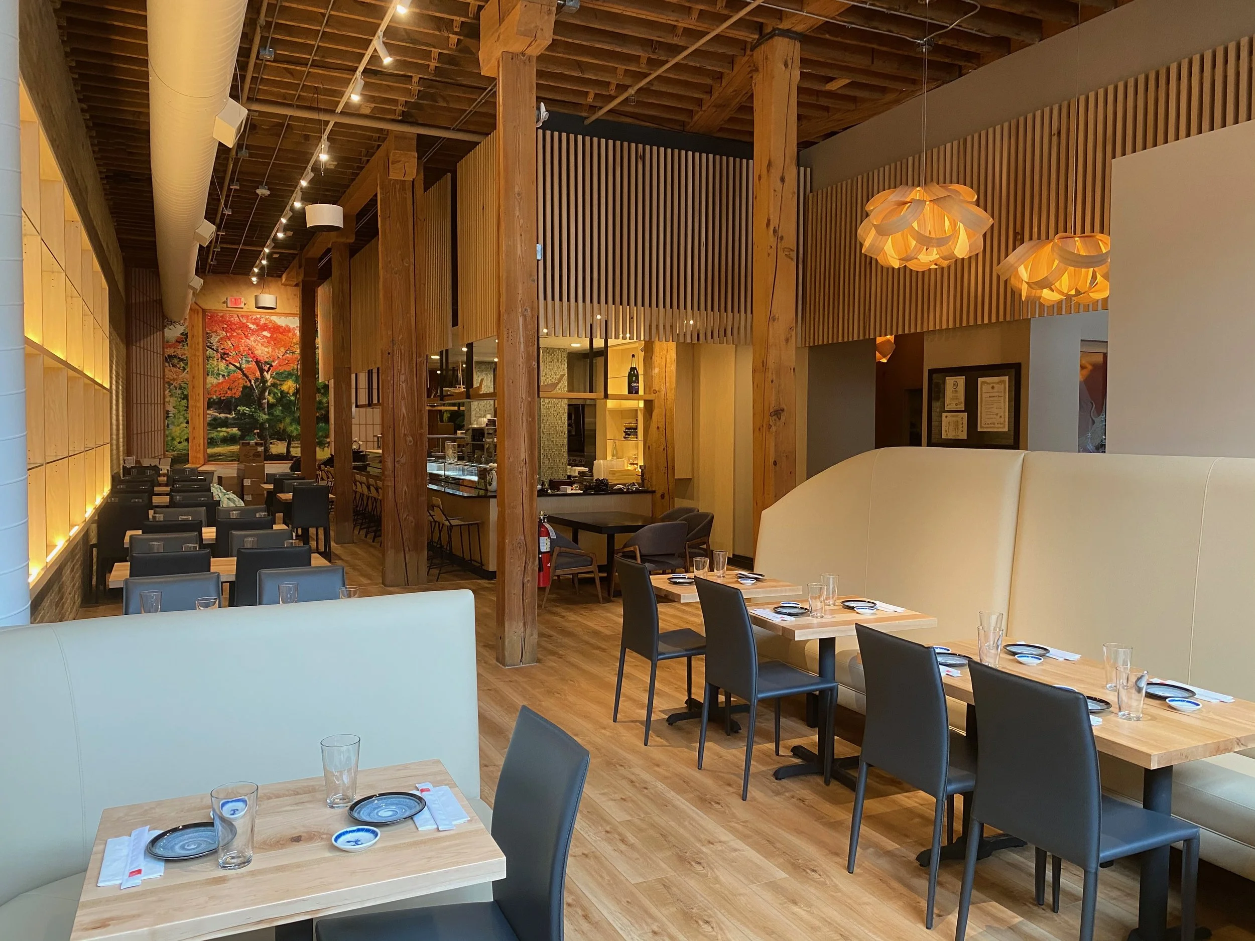 Commercial restaurant modern lighting installed by Walter Electrical Contractors in Minnesota, featuring pendant lights and ambient lighting throughout a modern restaurant dining area.