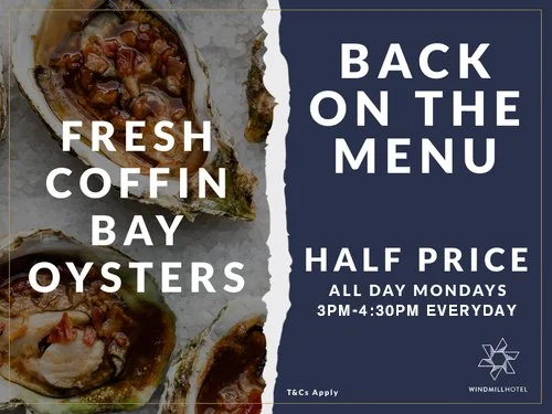 Advertisement for half price Oysters, all day Mondays and between 3pm-4:30 every day.
