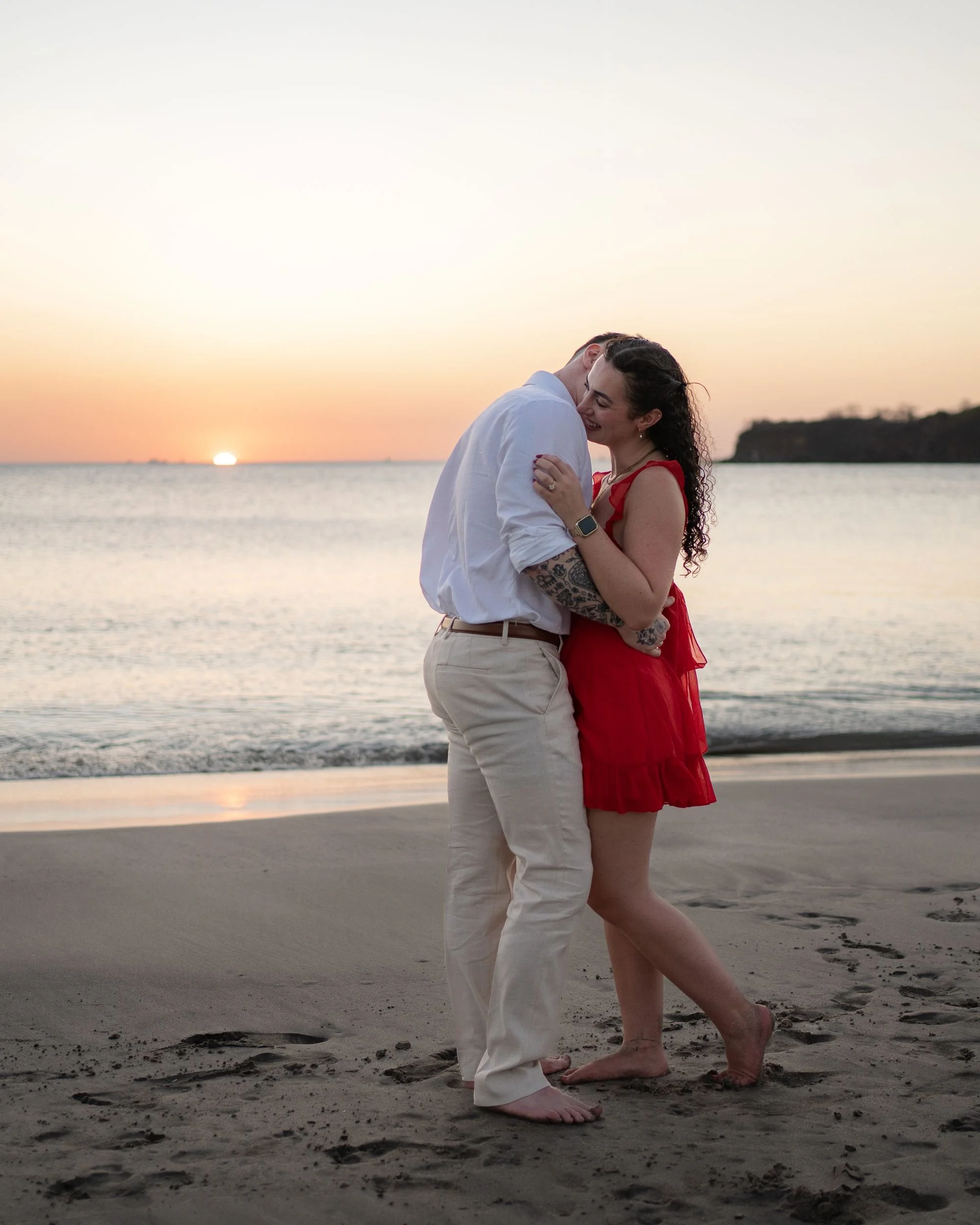 Sunset proposal moment on Playa Flamingo, Guanacaste, Costa Rica