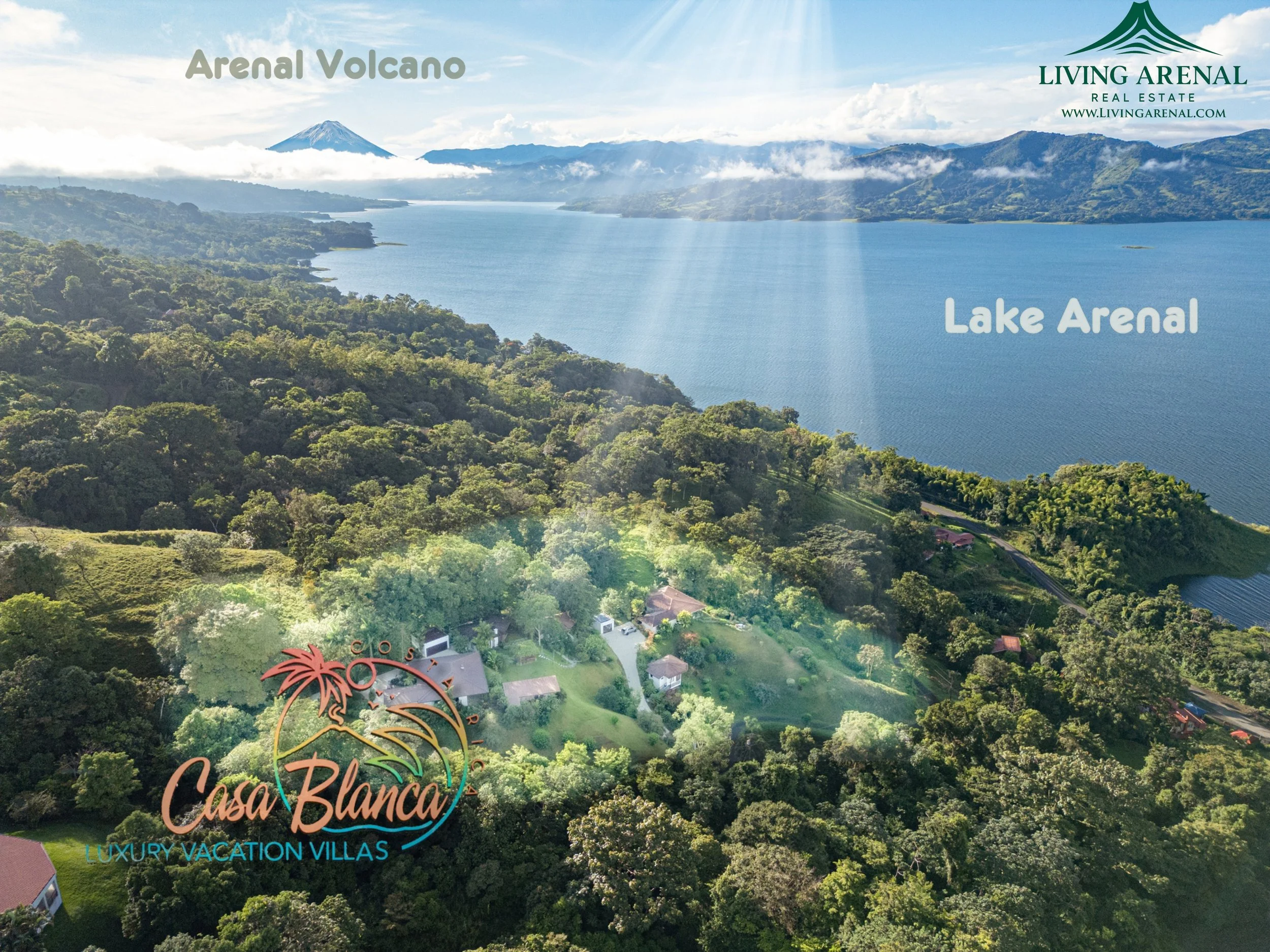 aerial view of Lake Arenal with surrounding forest and mountains, including Arenal Volcano in the background, with text labels for Arenal Volcano and Lake Arenal, and a logo for Casa Blanca Luxury Vacation Villas.