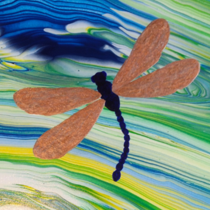 10x20 acrylic painting of two dragonflies with warm-toned wings over a blue and green flowing abstract background
