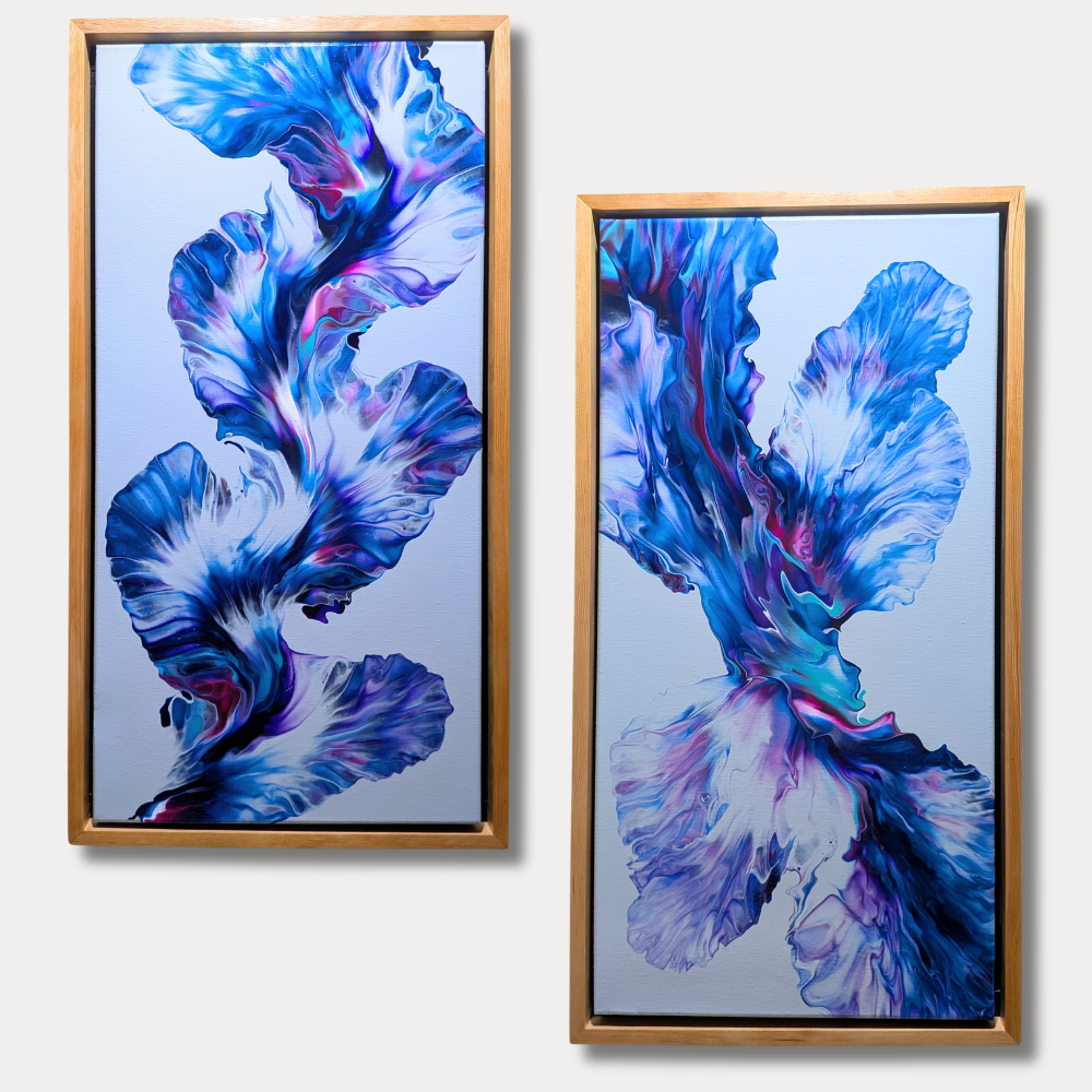 set of two 12x24 framed acrylic abstract paintings with flowing blue, purple, and magenta petal-like forms on a light background