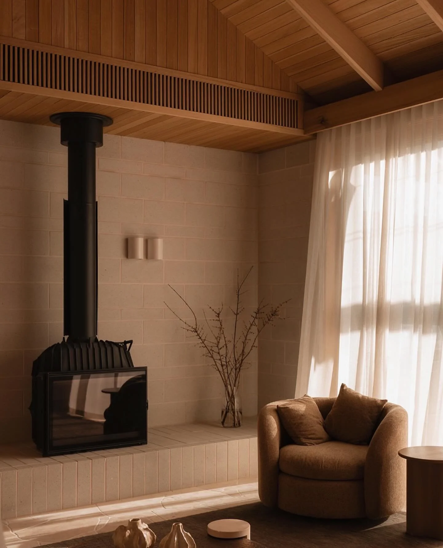 Material Impact via @wolveridge 

When materials speak for themselves. The timber lined ceiling draws the eye upward, soft linen curtains and furniture brings a sense of calmness and textured brick anchors the space. 

Each element playing its part i