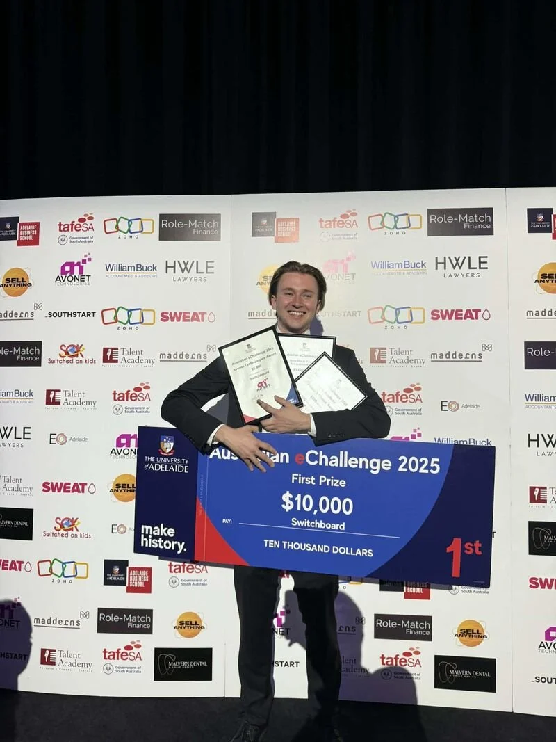 THPS client Harry Cross holding $45,000+ of awards from winning the Adelaide Uni eChallenge pitch competition