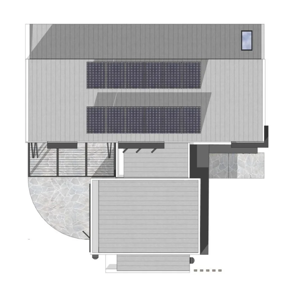 Top-down view of a house with solar panels on the roof, a small platform with stairs leading up to the entrance, and a stone patio.