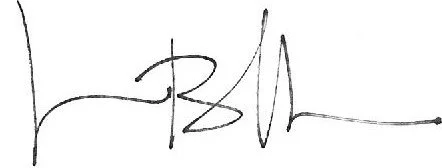 Firma a mano in nero su sfondo bianco.