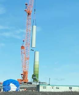 The tower to support the turbine blades was erected in May 2023