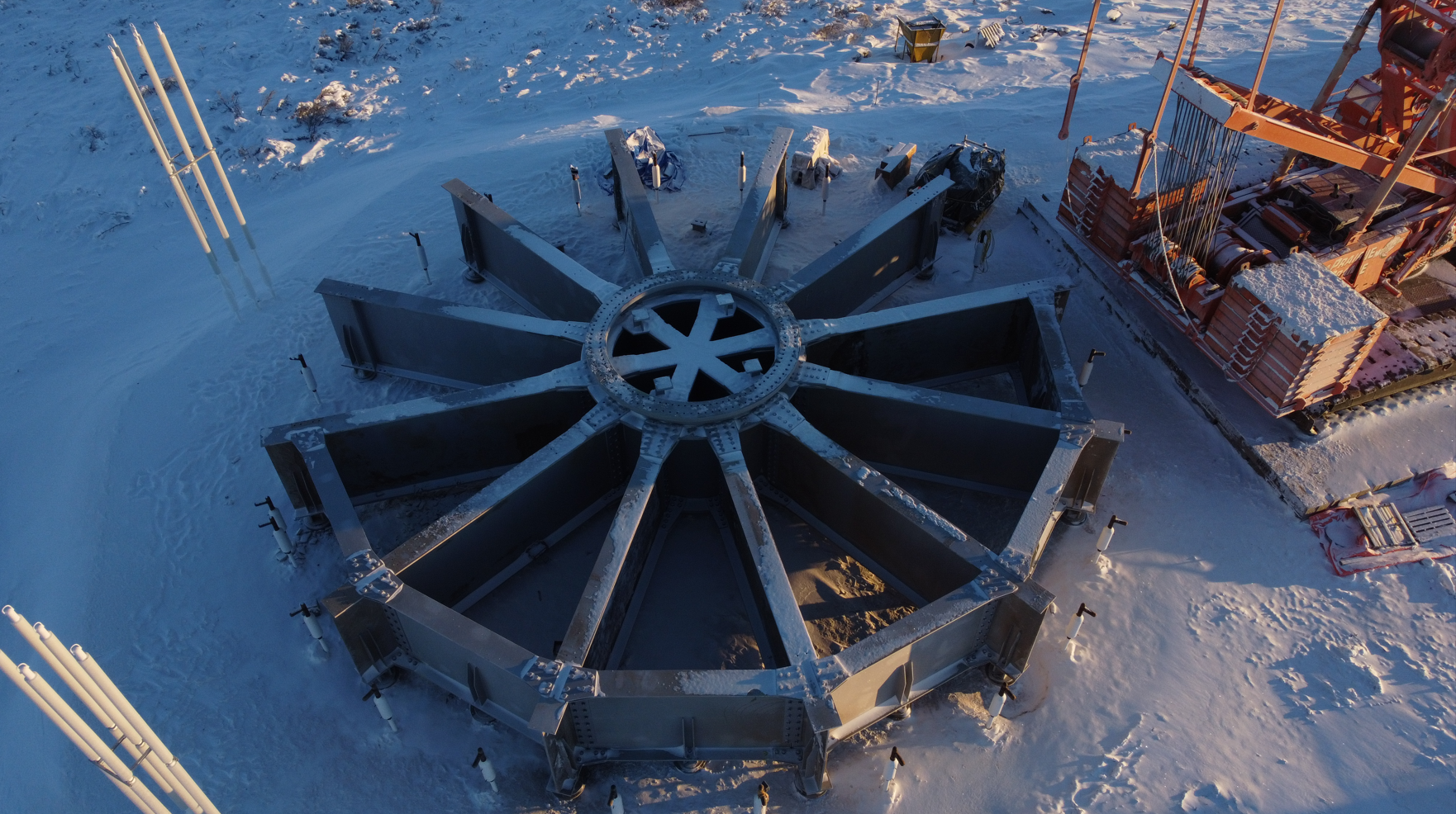 Installation of the structural steel spider frame that will support the wind turbine continued despite the arrival of winter