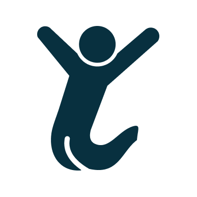Silhouette of a person jumping with arms raised.