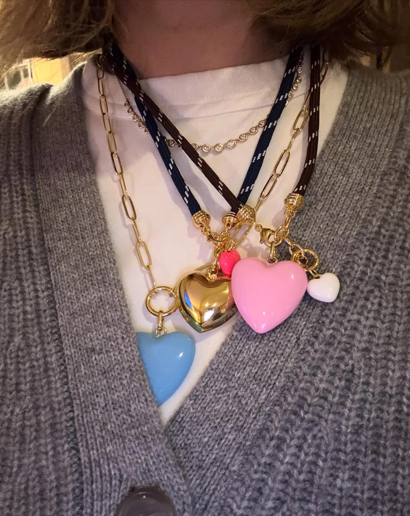 How many hearts are too many hearts?? 💛🩷🩵Playing with different color combos for December pop ups! Our fan favorite gold puffy hearts from last holiday season is making a reappearance now in a bunch of different color options! Add to a para cord n