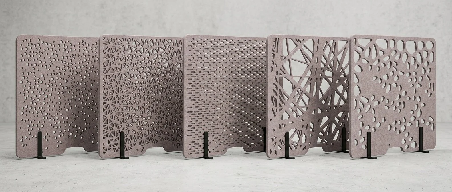 Fünf EchoCove DeskOne PERF-Designs Sparkly, Mesh, Pen, Beam und Gecko nebeneinander