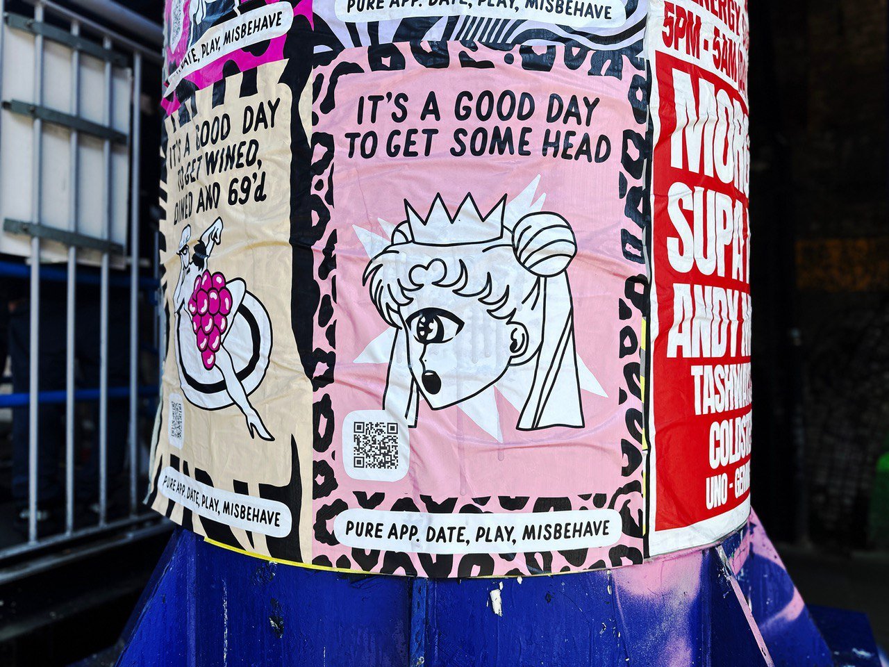 Colorful posters featuring cartoon-style illustrations and text, including a girl with a crown and short hair, and messages about having a good day, playing, and misbehaving.