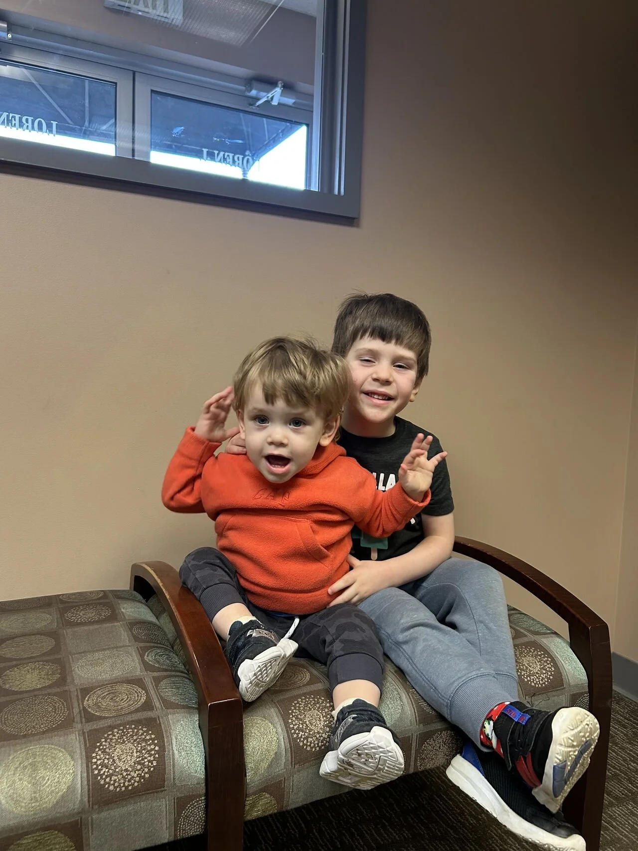 brothers sitting together