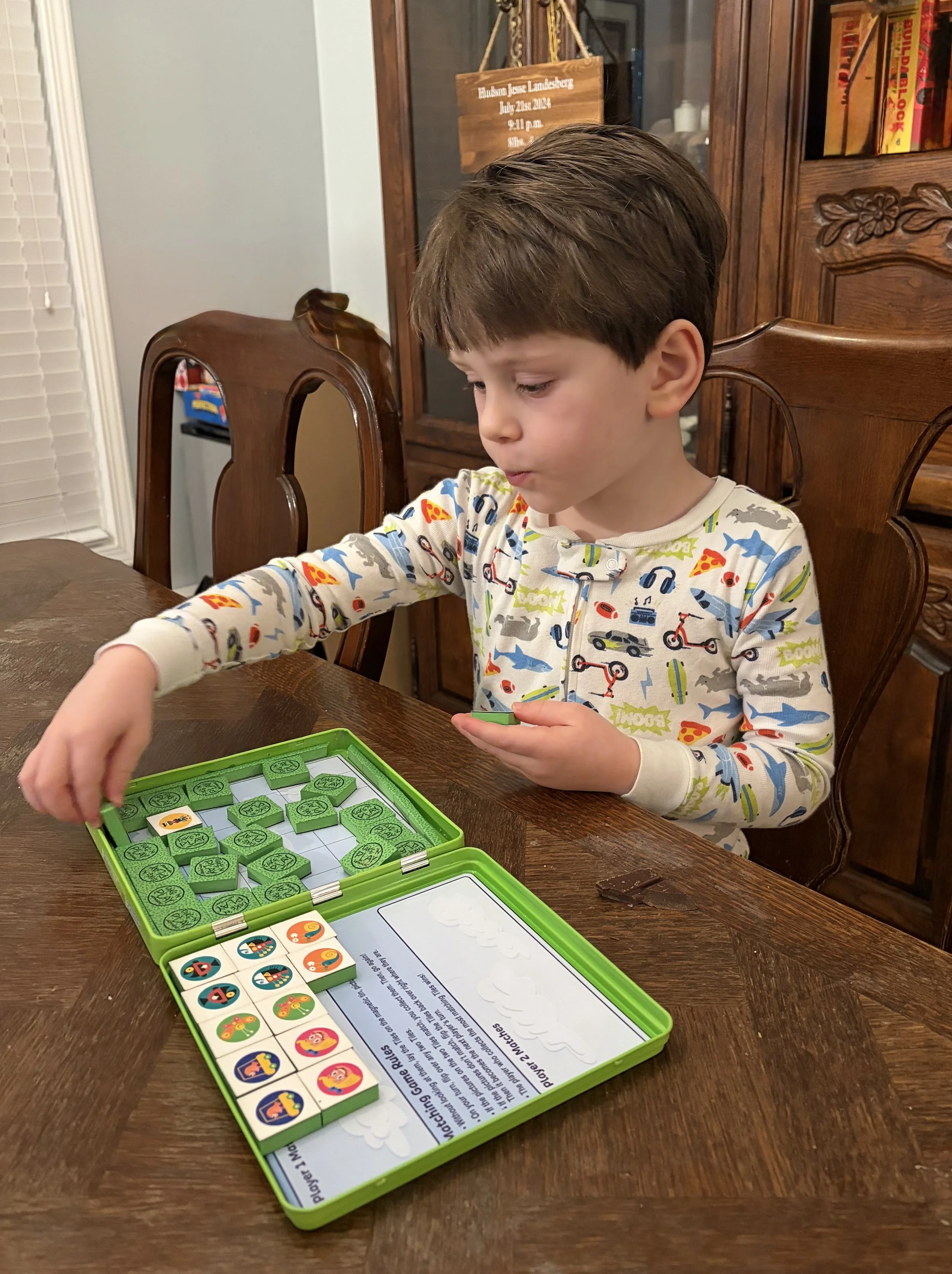 Boy playing matching game