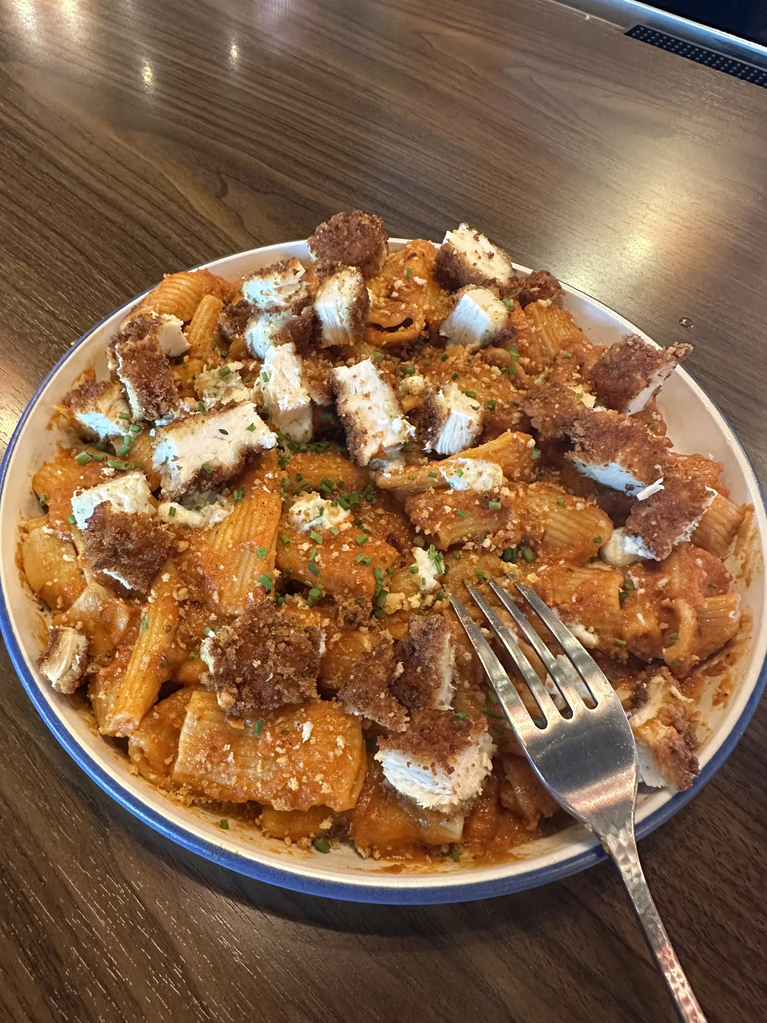 fresh house made italian rigatoni pasta with chicken cutlet