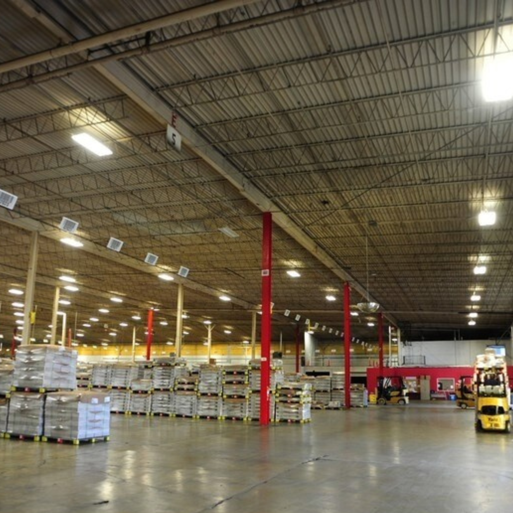 the inside of a warehouse that was created and designed by CM Collaborative