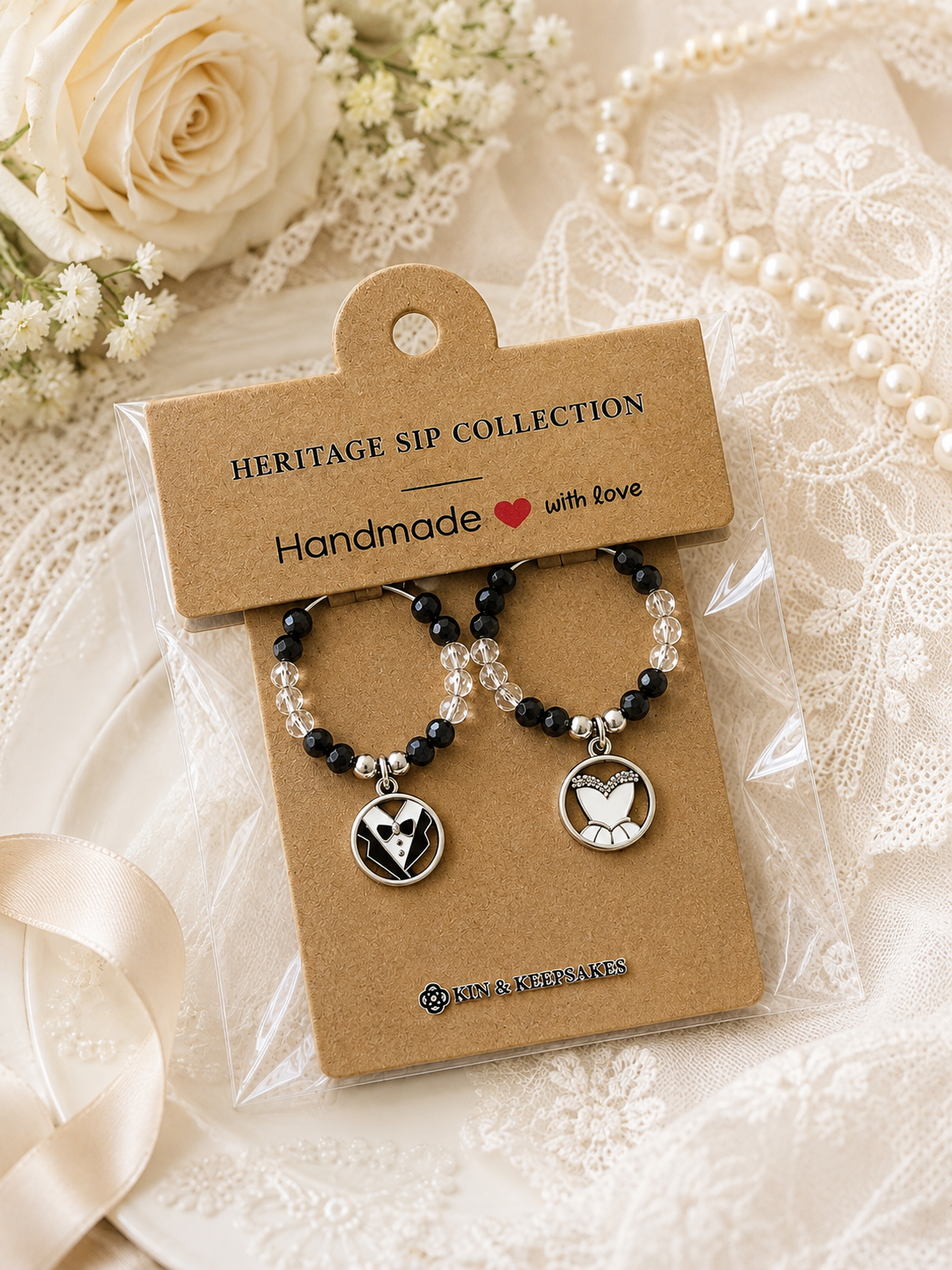 Mr and Mrs Wine Charm Duo in Kin & Keepsakes packaging with elegant wedding styling