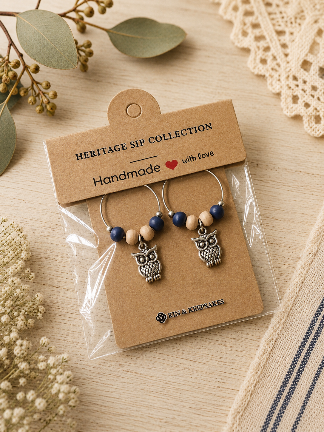Riverbank Blue wine charm duo presented in handmade gift packaging