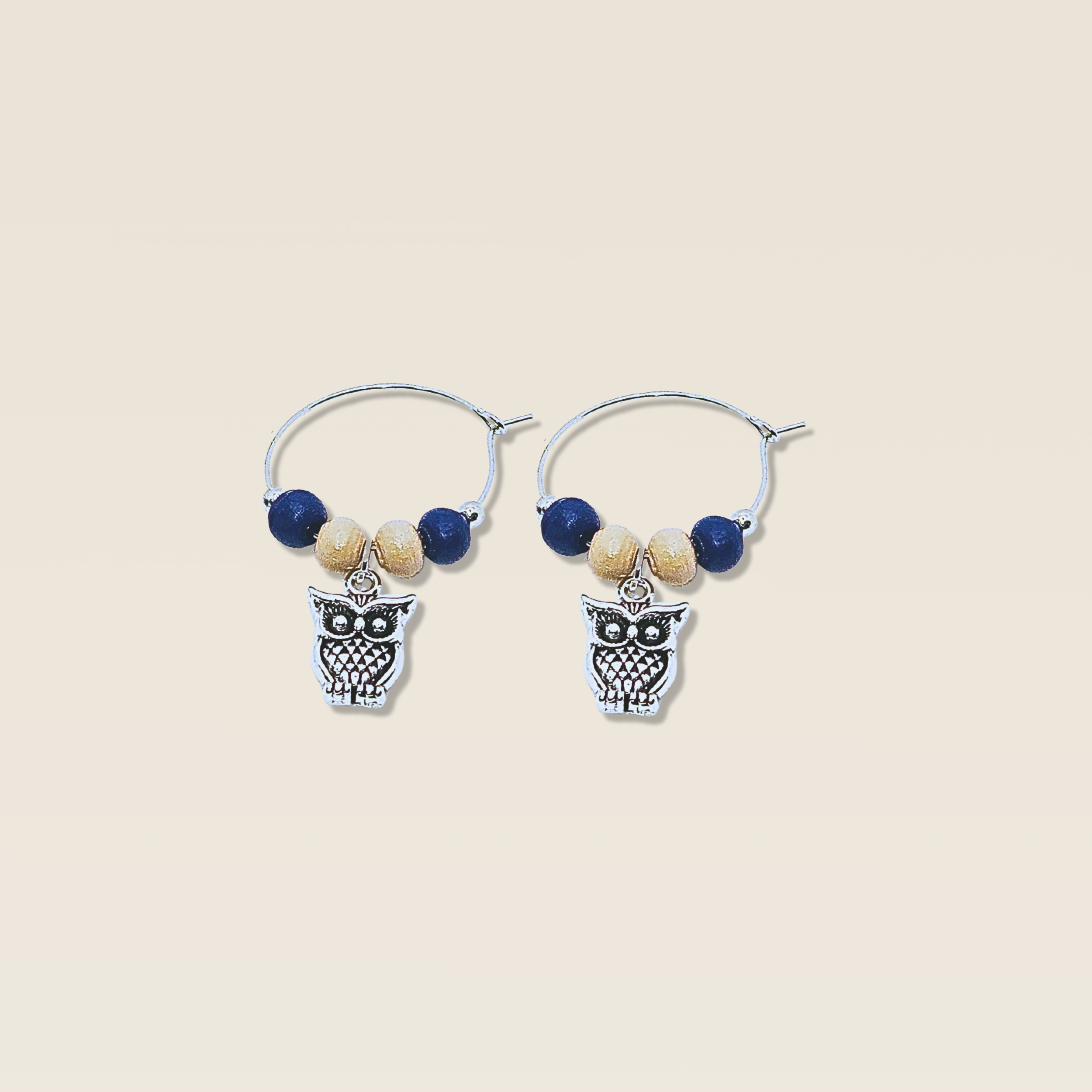 Riverbank Blue wine charm duo with silver owl charms and blue and sand beads