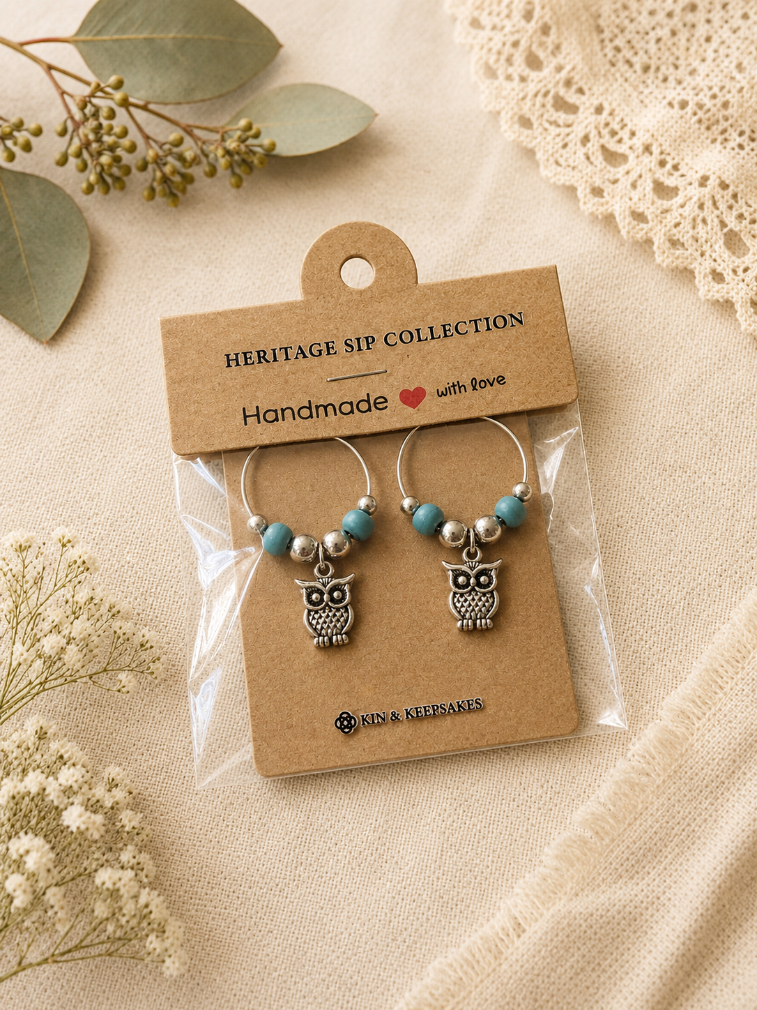 Springtime wine charm duo presented in handmade gift packaging