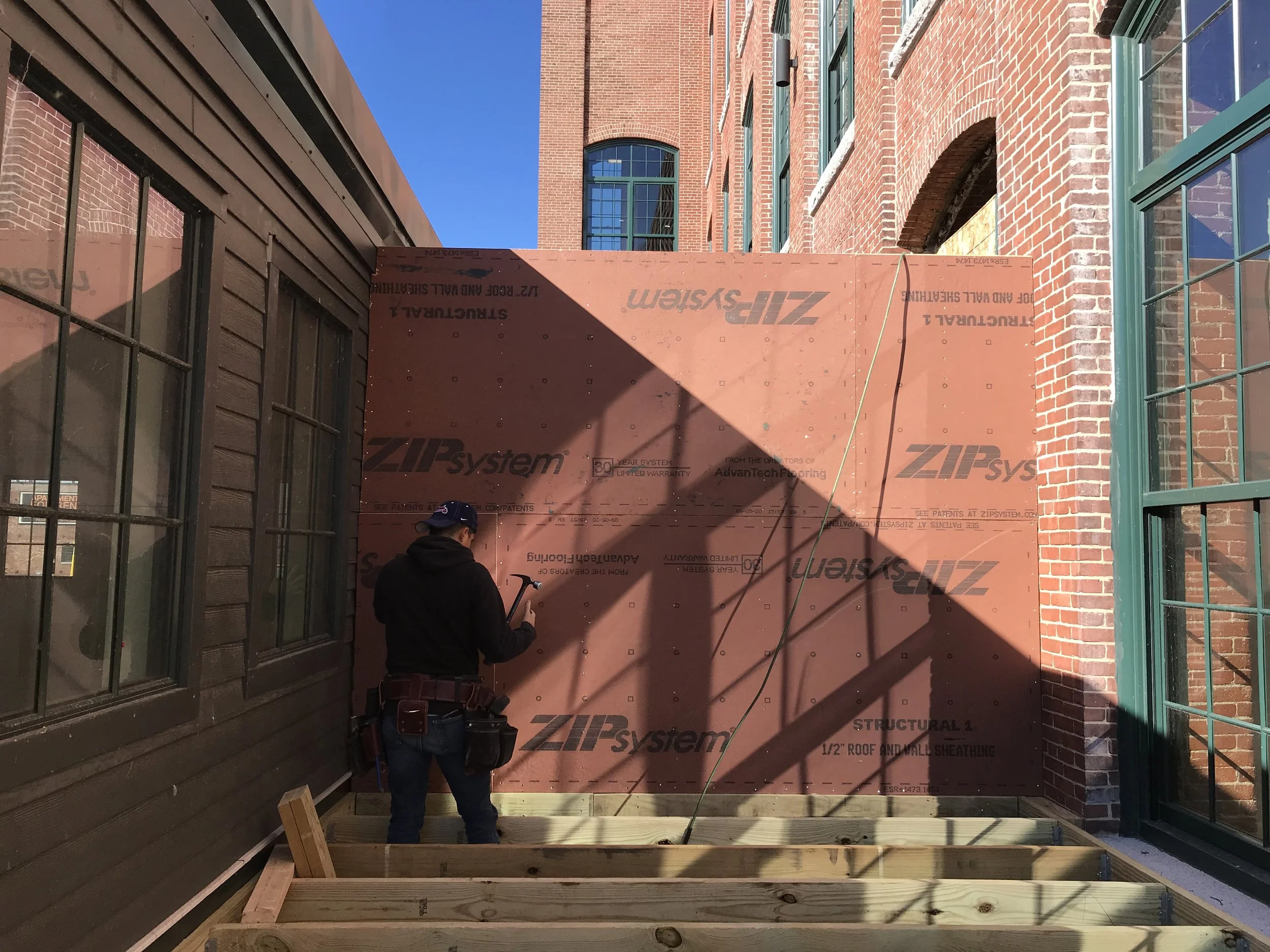 exterior drywall worker.jpg