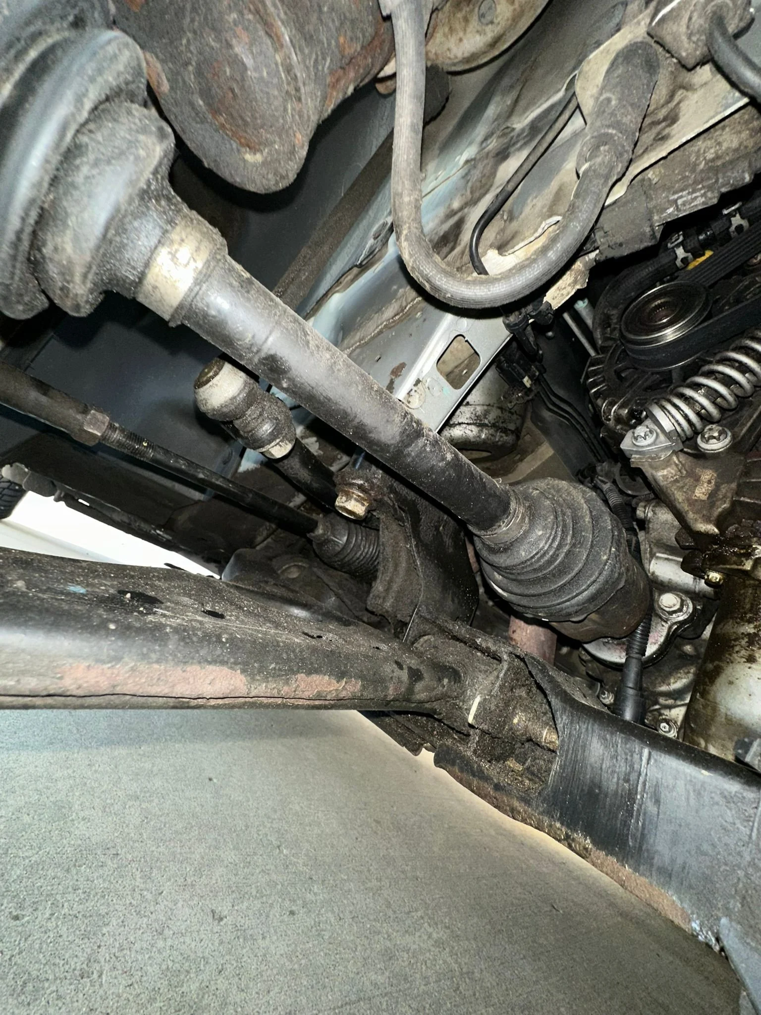 automotive drivetrain and suspension components inspected during repair service